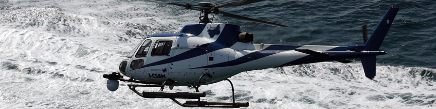 AS 350 Helicopter fitted with gyro stabilised camera system at work over the Mediterranean